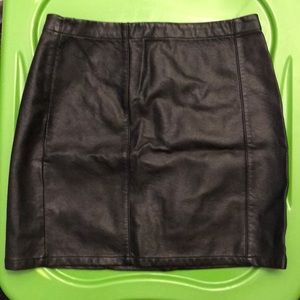 Black imitation leather mini skirt